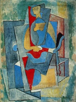 パブロ・ピカソ Painting - 赤い肘掛け椅子に座る女性 1932年 パブロ・ピカソ